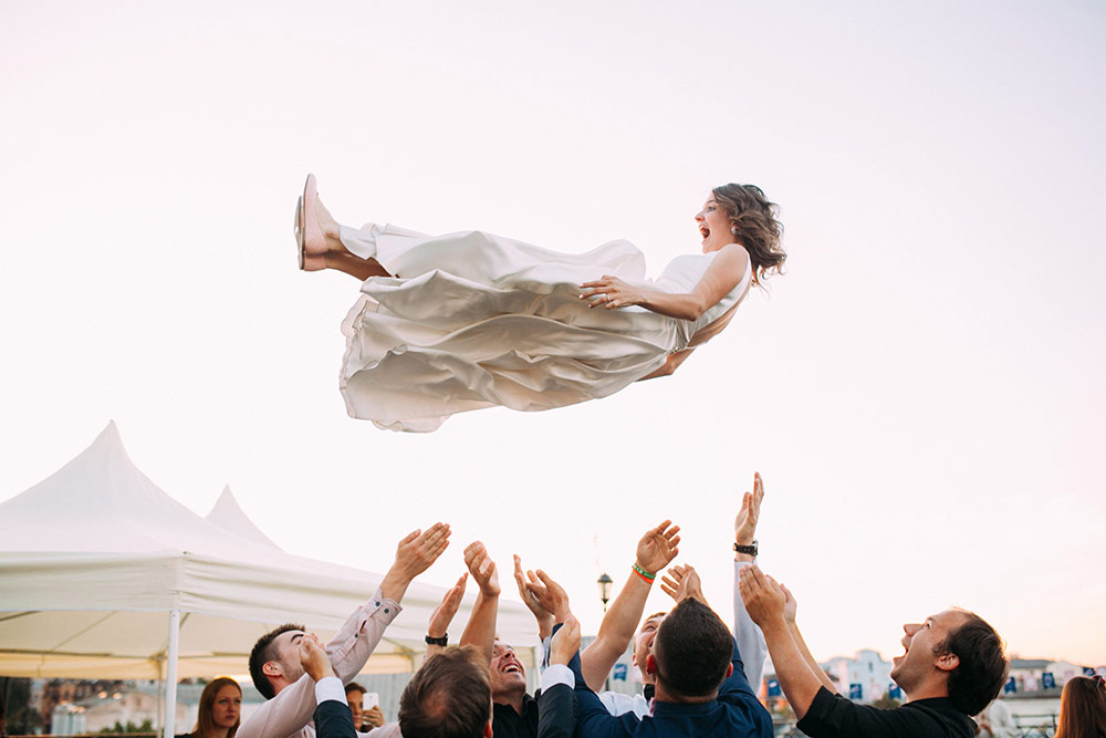 Bride Thrown in Air