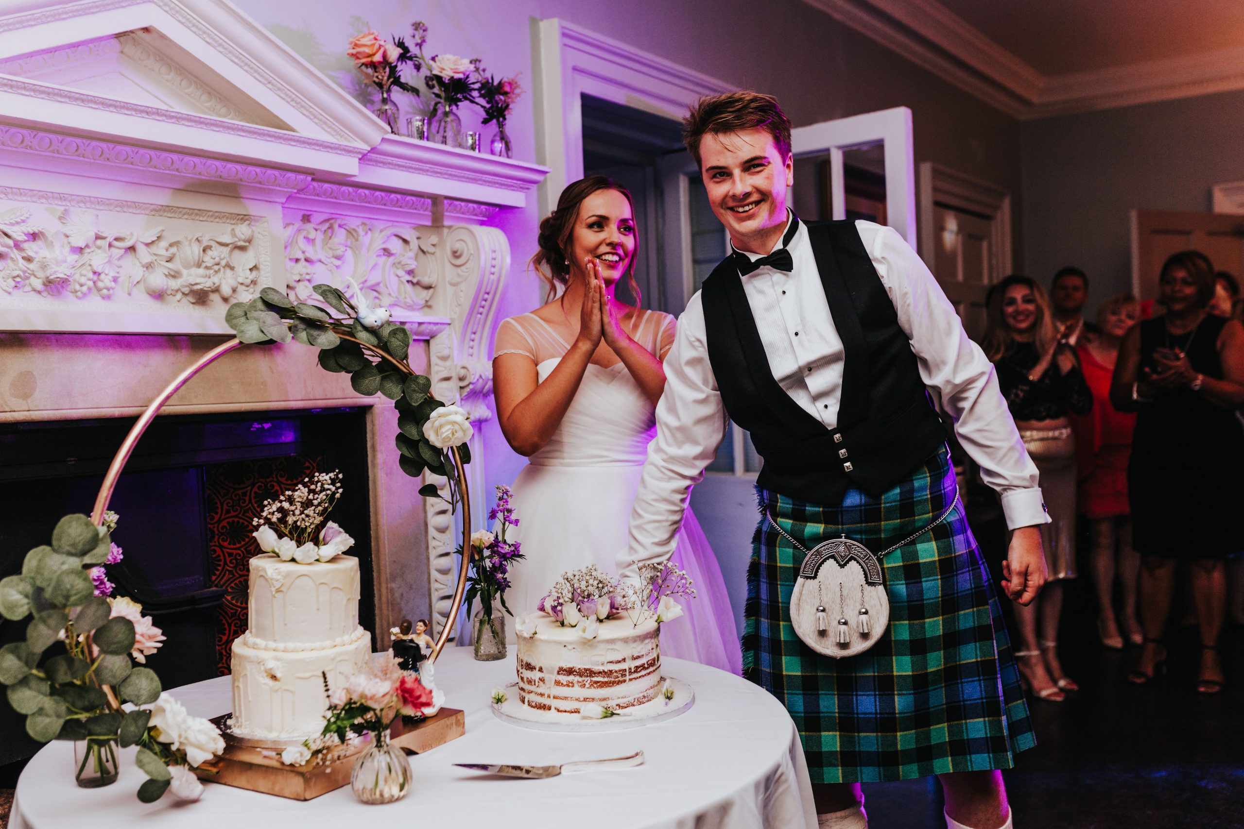 Clare and Harry Cutting The Cake