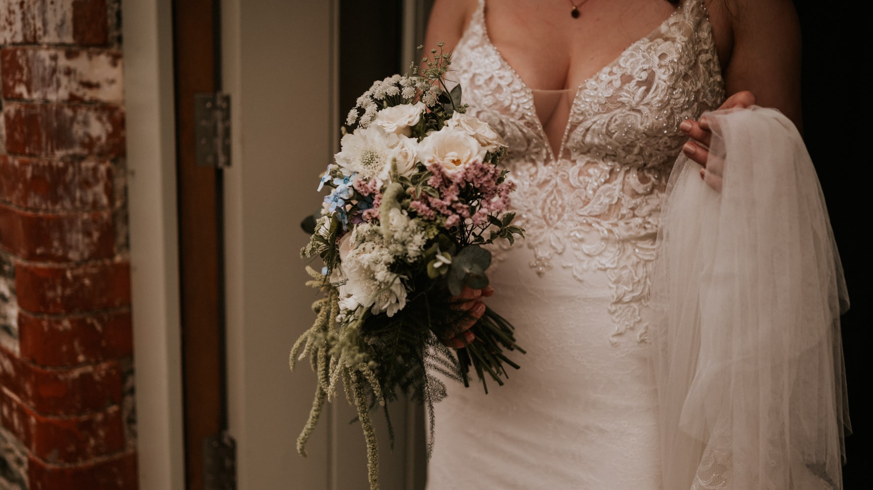 Lucy bride with bouquet, ready to get married