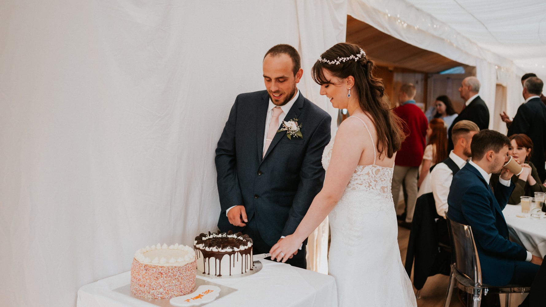 Bride and groom cutting the cake