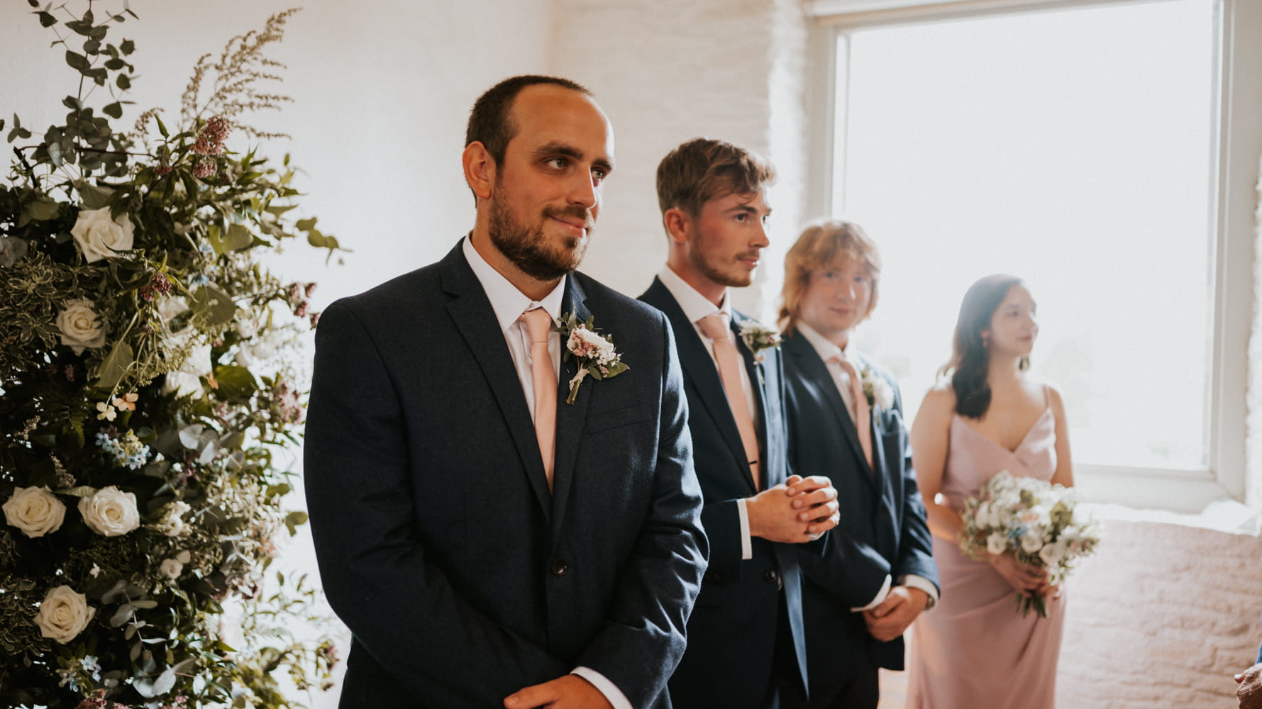 Matt the groom at the end of the aisle