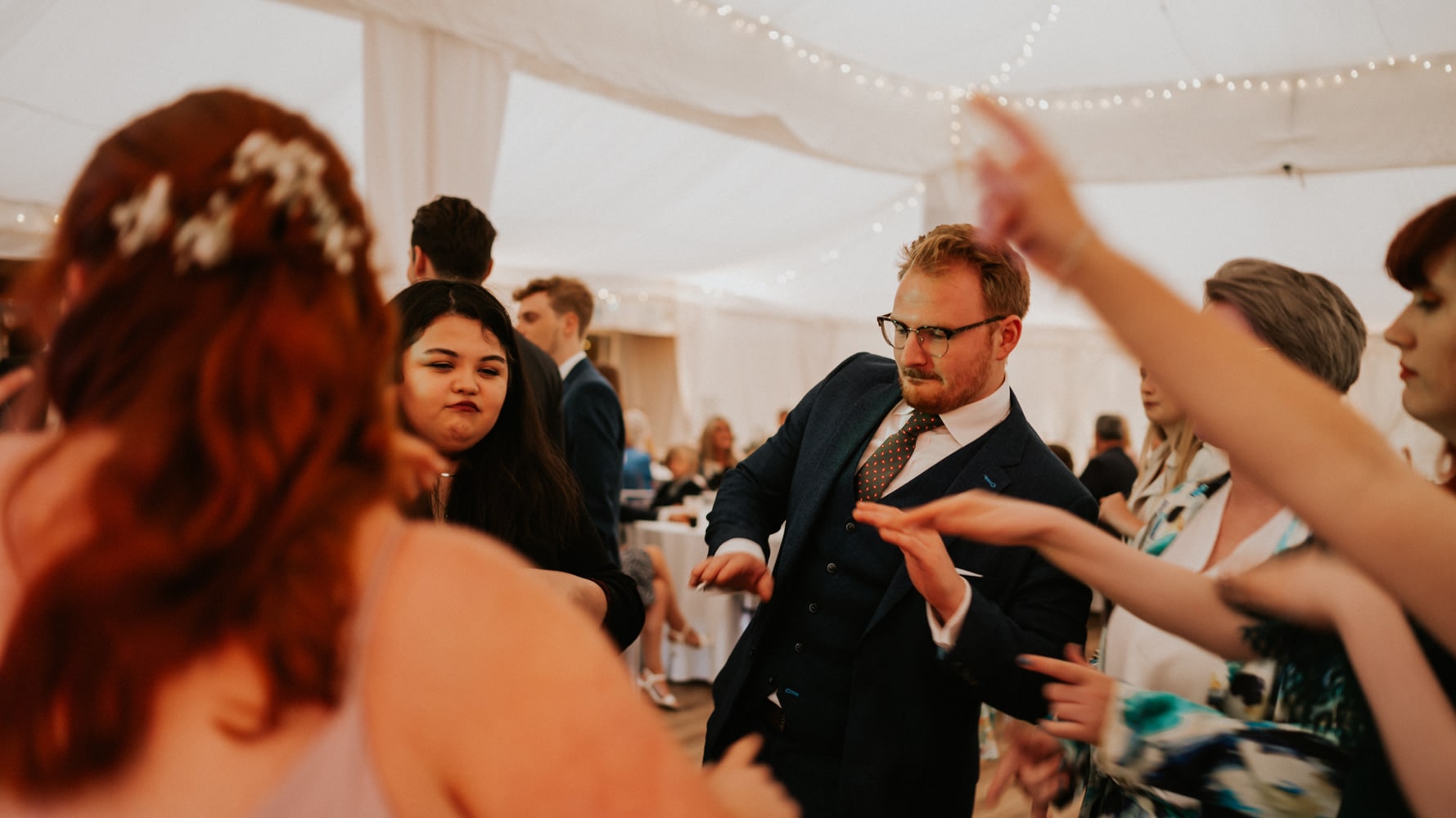 Wedding guests dancing