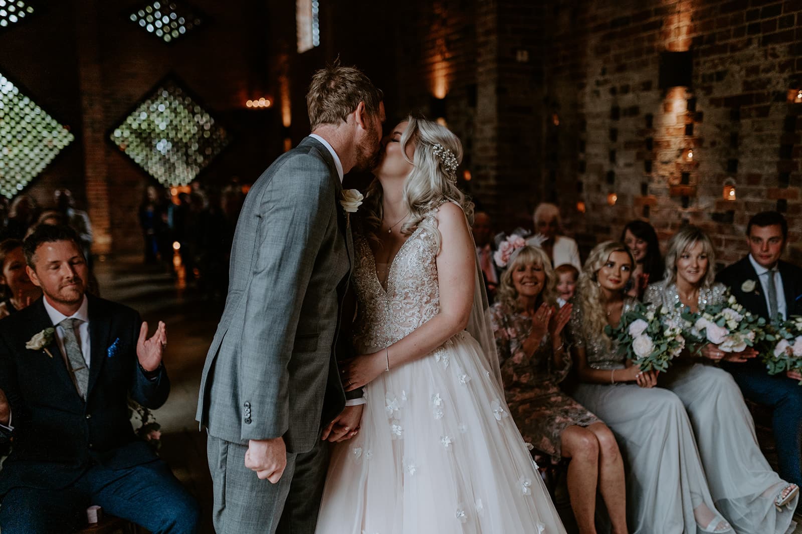 Emma and Mark ceremony kiss