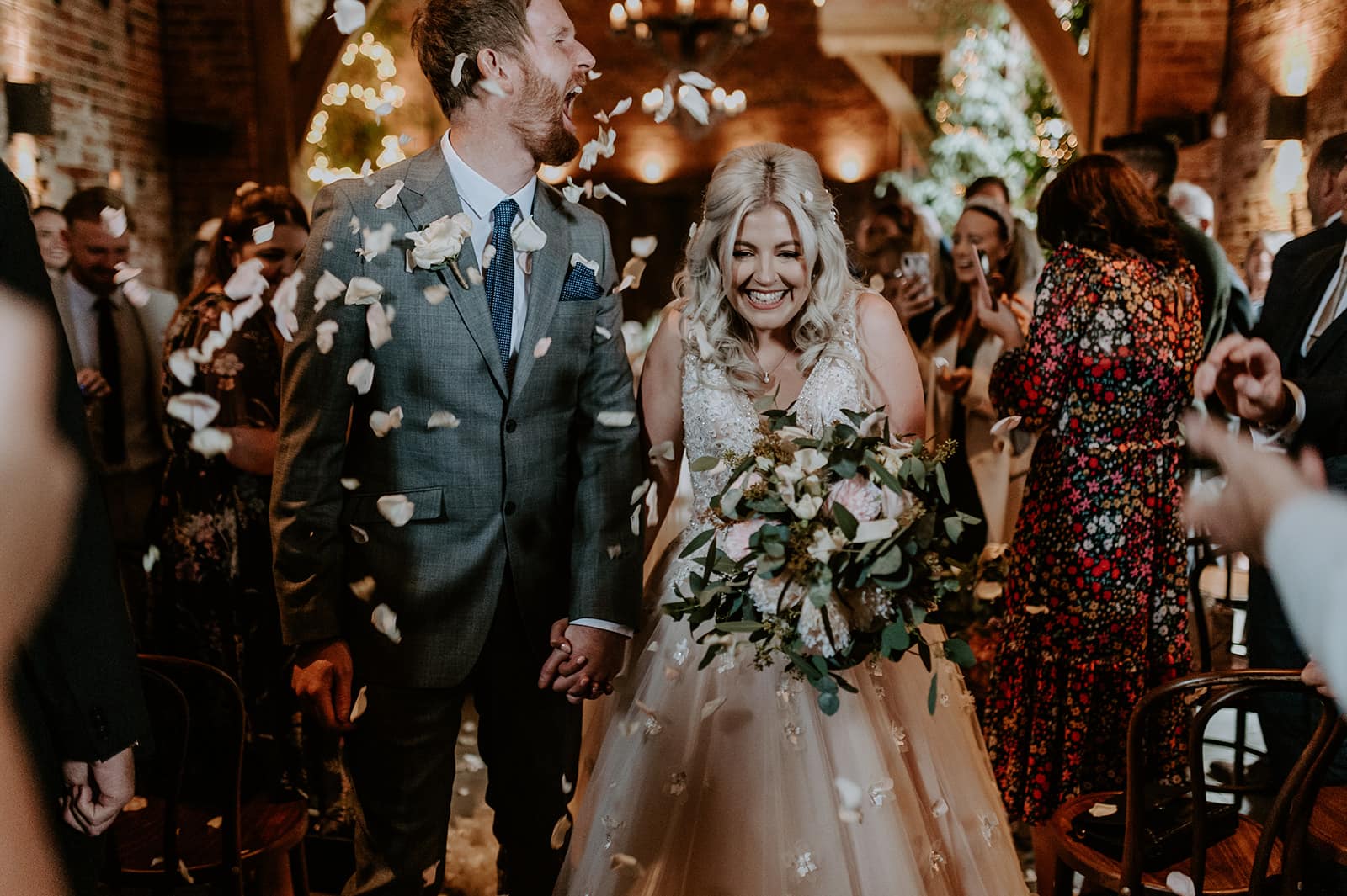 Bride and groom with wedding confetti