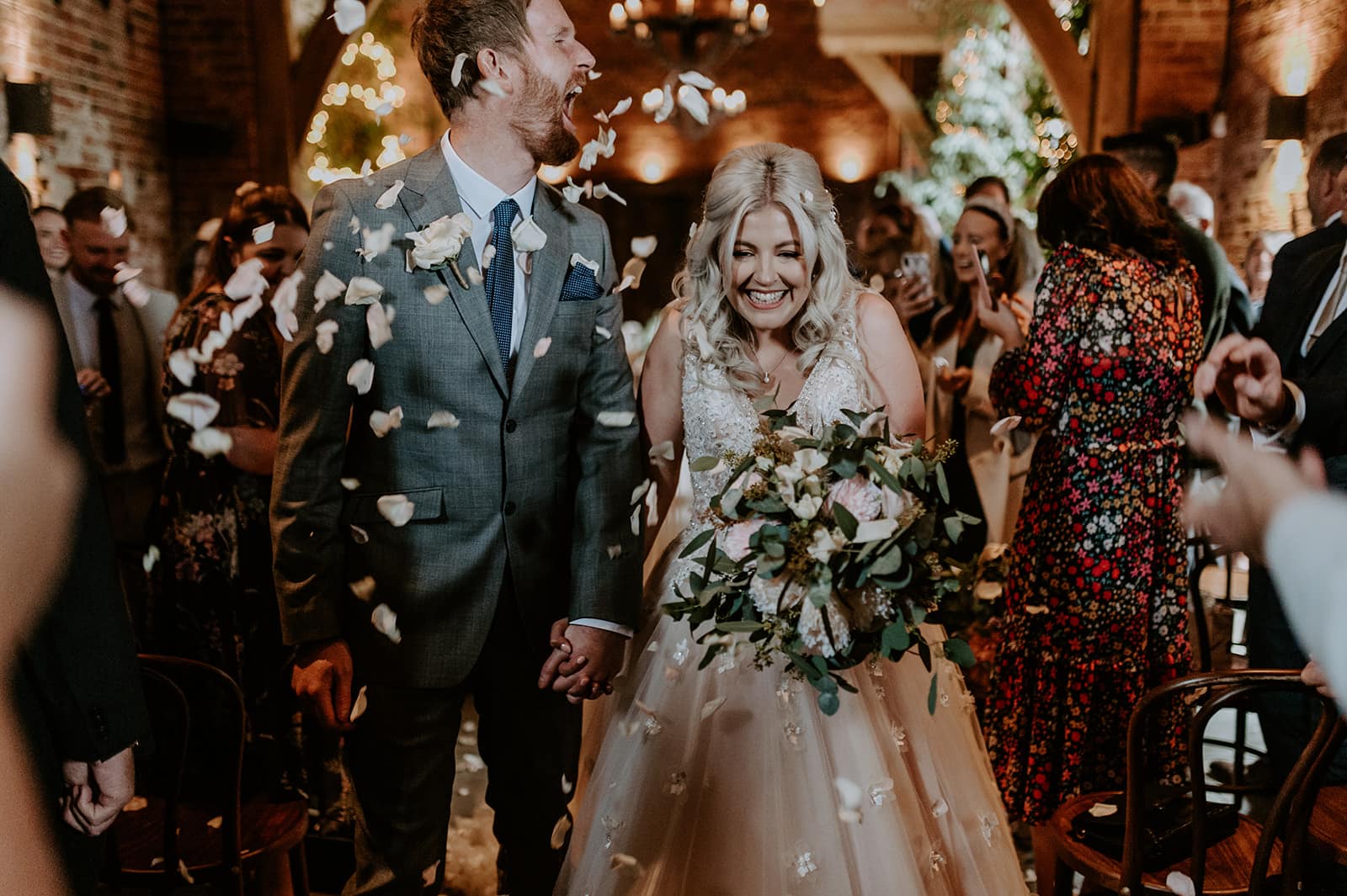 Bride and groom with wedding confetti
