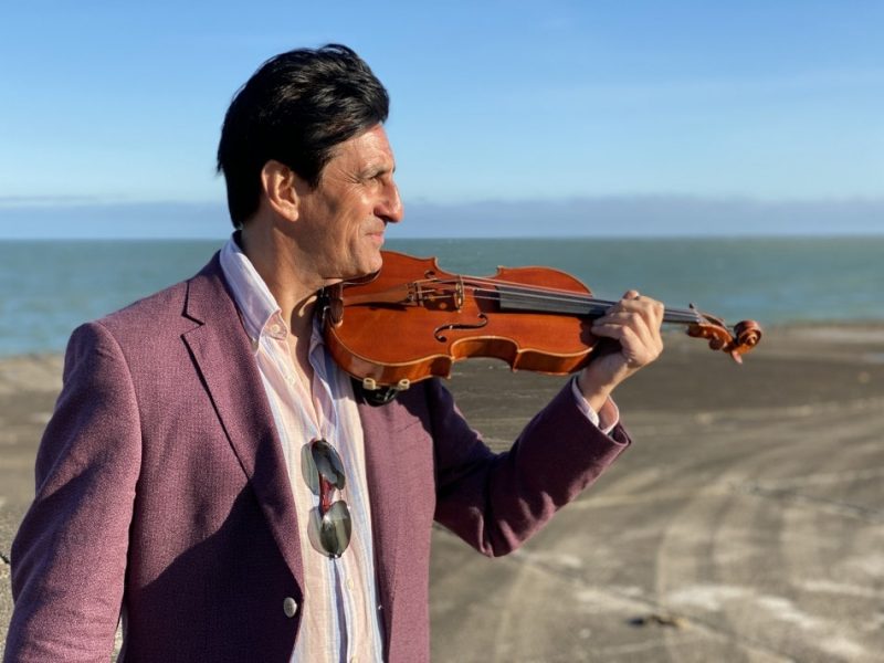violinist on beach