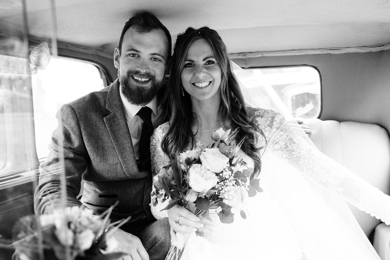 Helen and Richard in wedding car