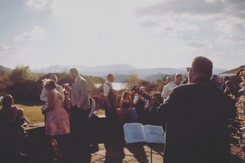 acoustic guitarist at drinks reception