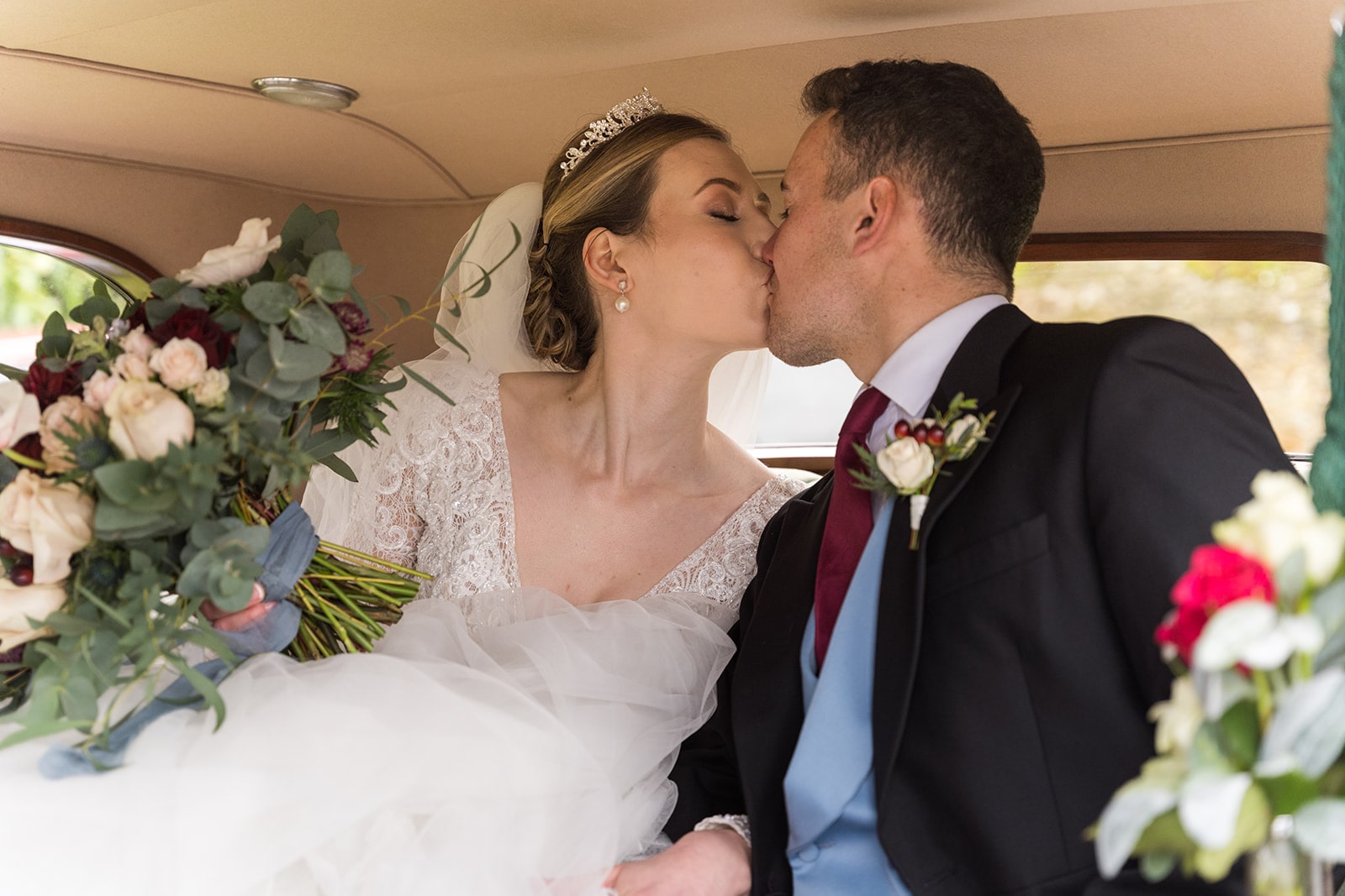 Wedding car kiss