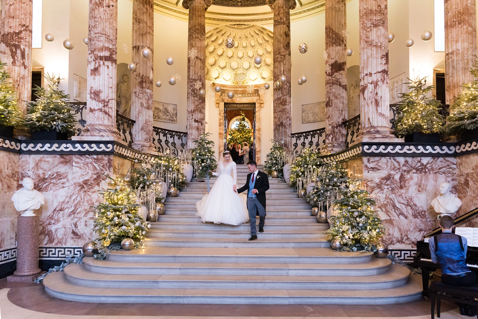 Will and Rachael walking down stairs