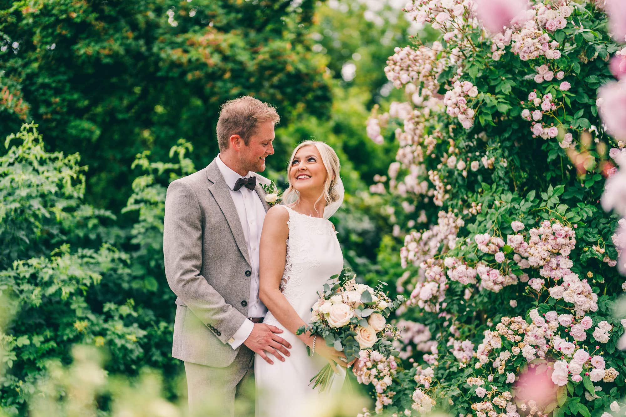 Fern and Will in floral background