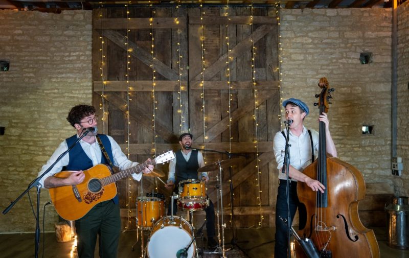 The Broadsmen performing as a trio