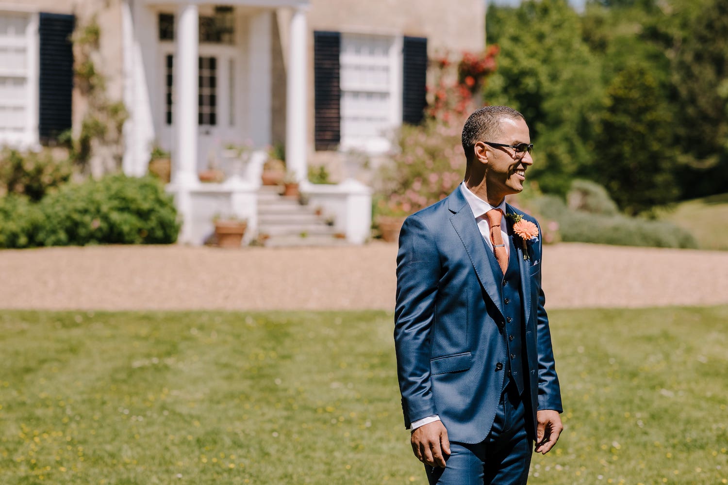 Groom in suit at venue