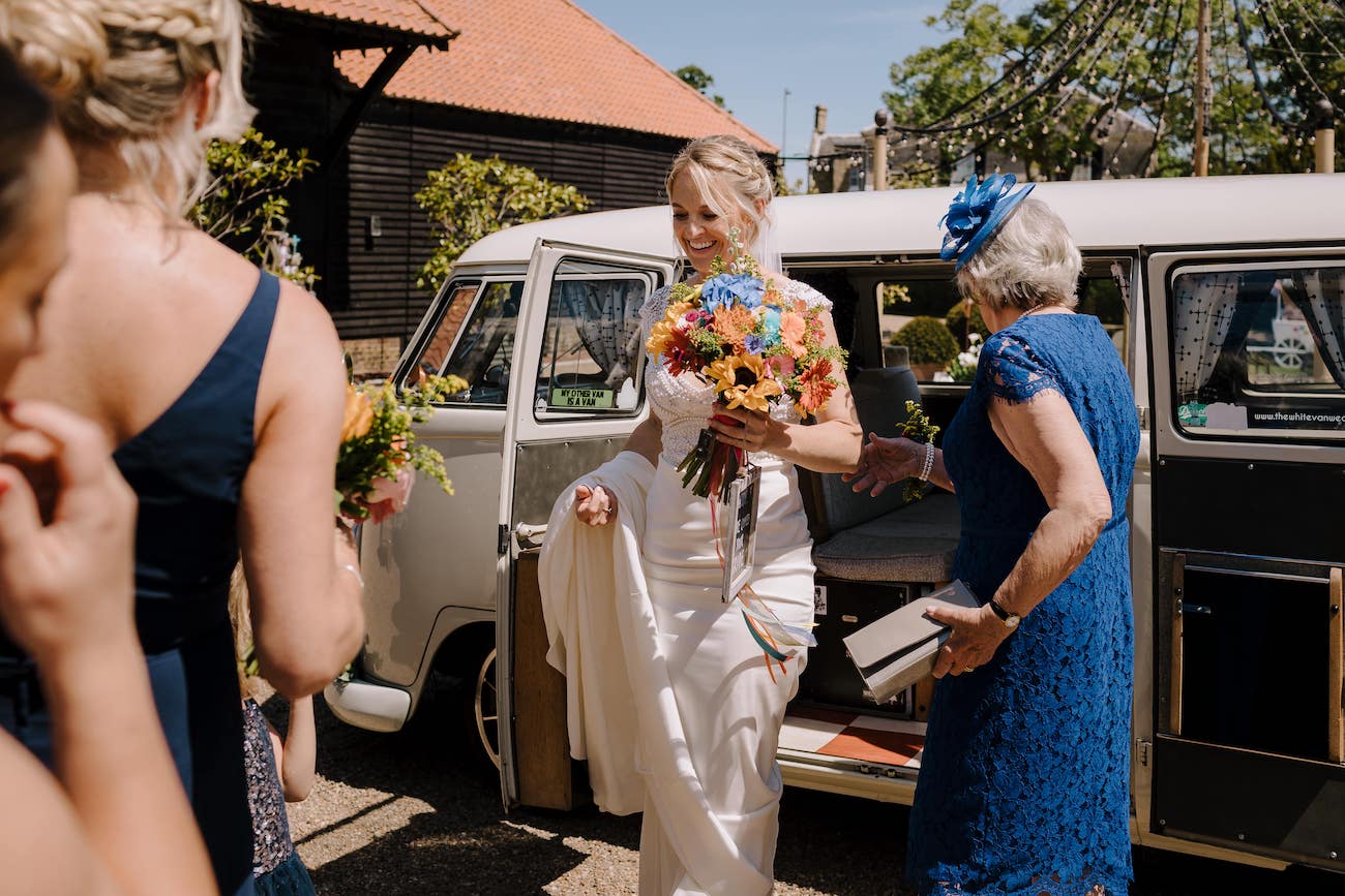 Bride arrives in VW Campervan