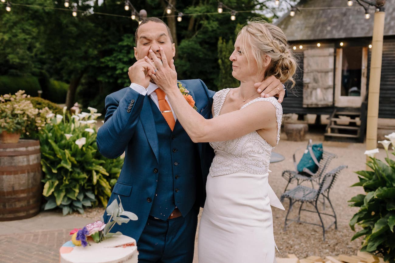 Bride feeding Groom Cake