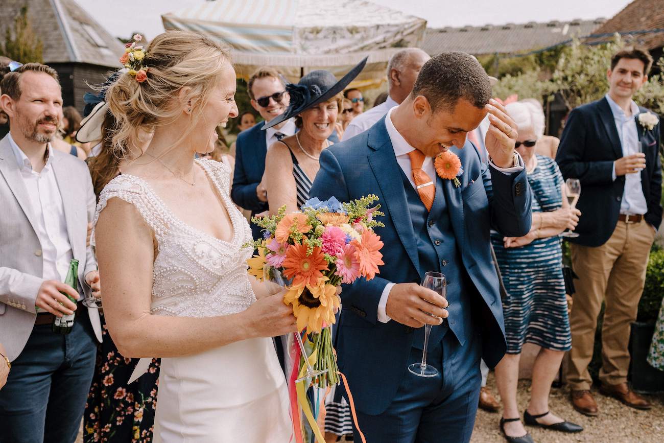 Bride and groom laughing