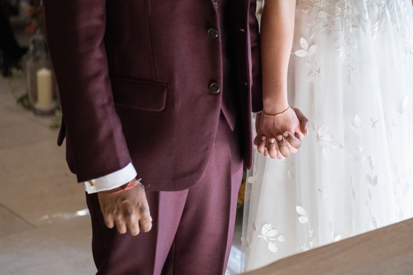 Bride and groom holding hands